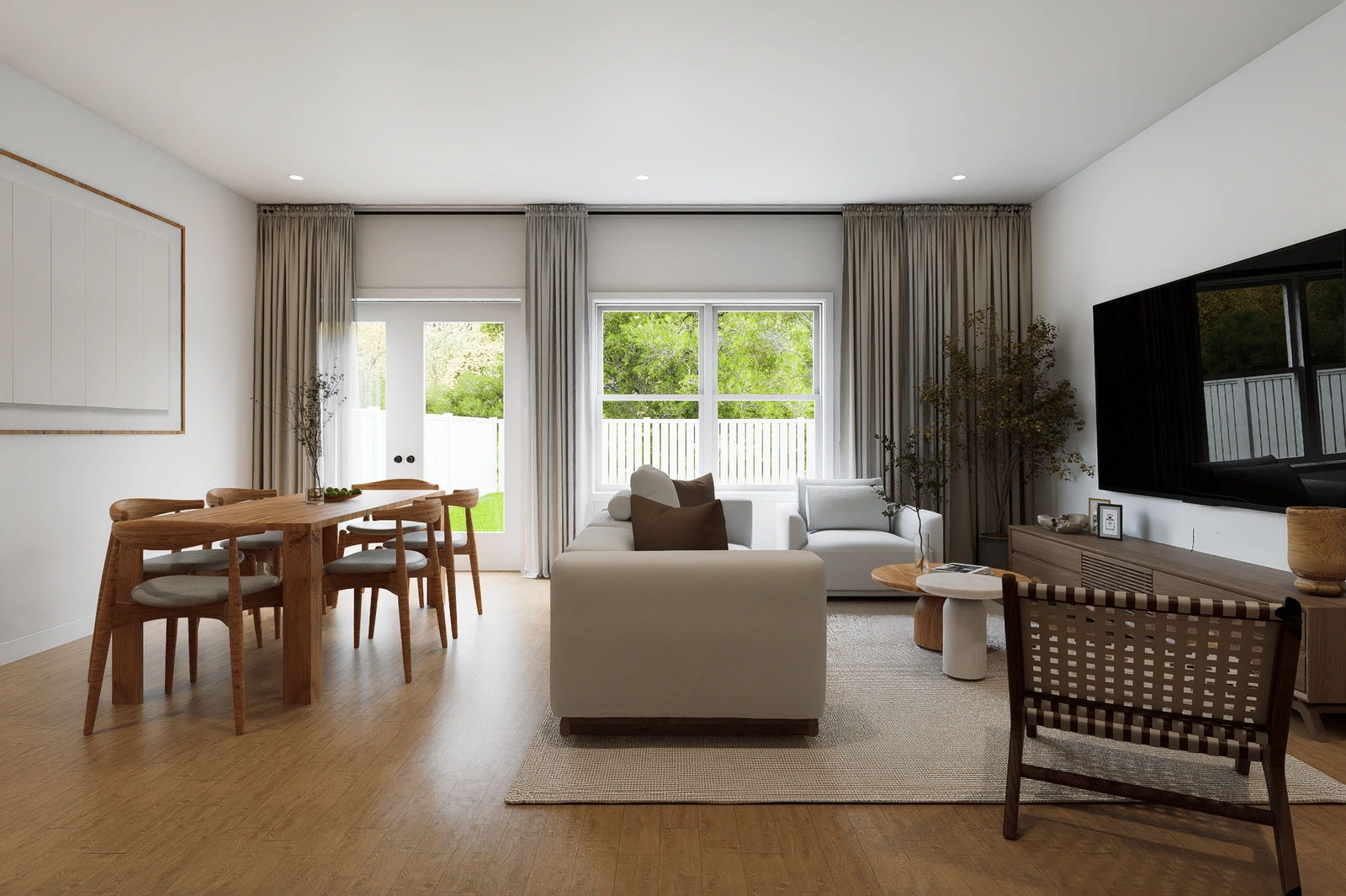 Rendering of an open-plan living and dining room with backyard views at Aurora Oaks in Ocala, FL.
